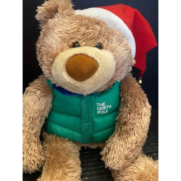 Hallmark Plush North Pole Teddy Bear Stuffed Animal Santa Hat Green Puffer Vest - Picture 2 of 7